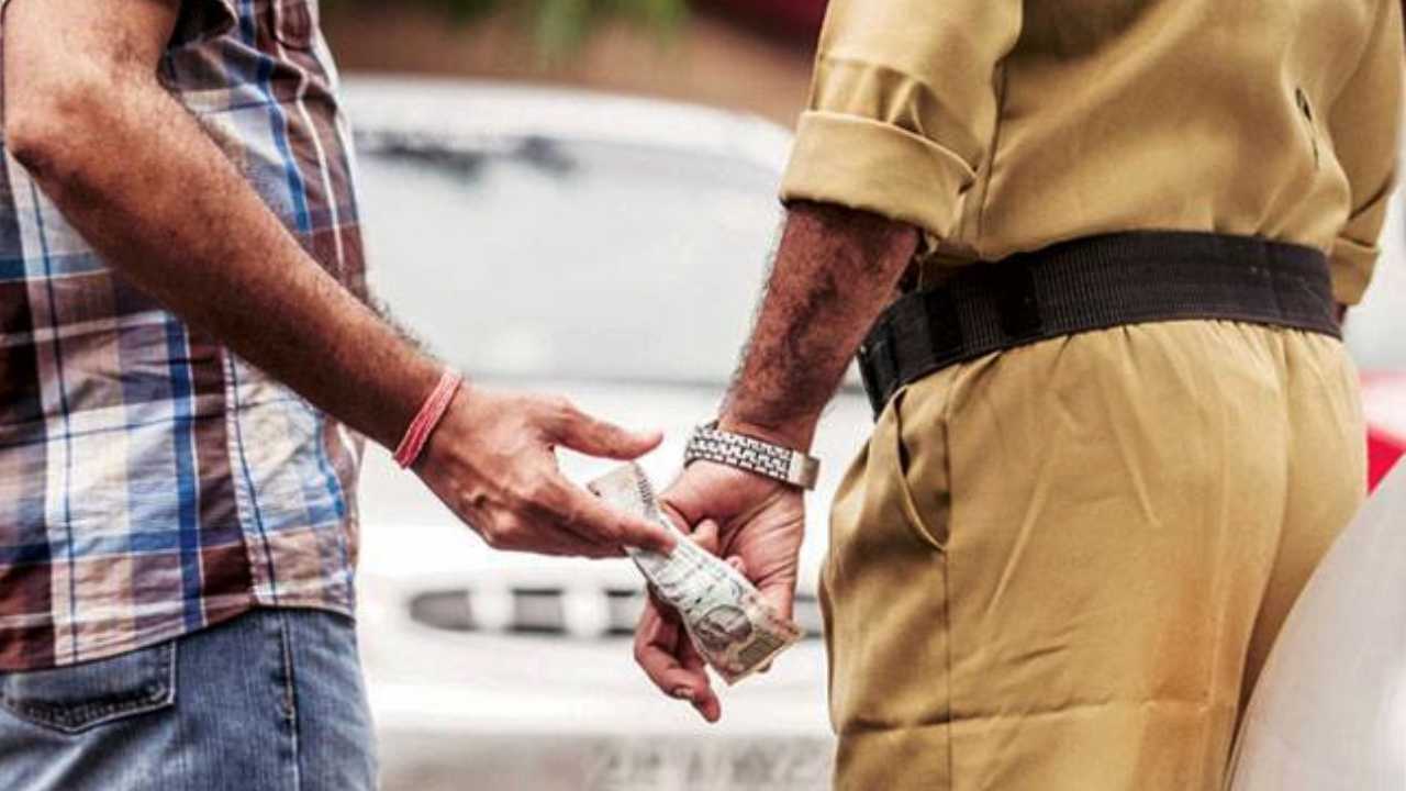 policeman taking bribe