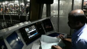 train pilot and co-pilot conversation during a train ride at night